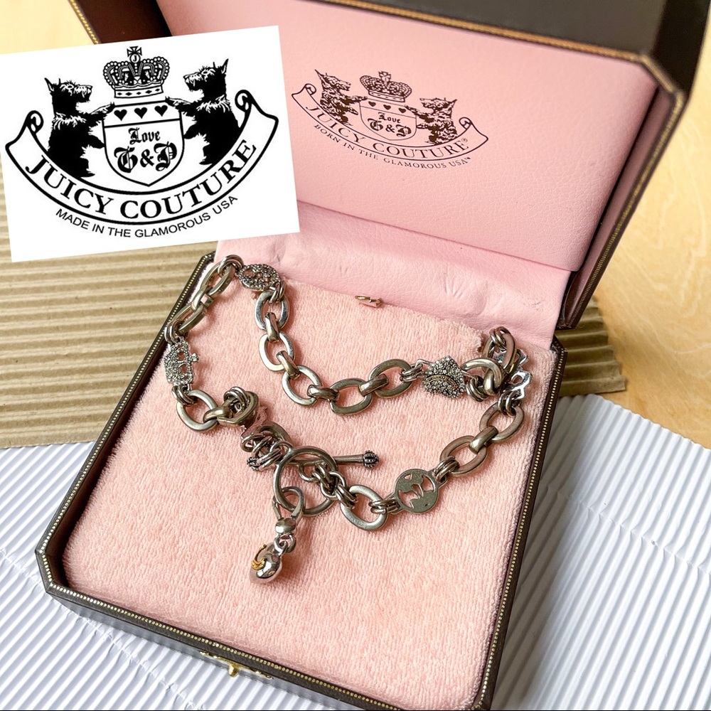 JUICY COUTURE Silver charmed toggle necklace.